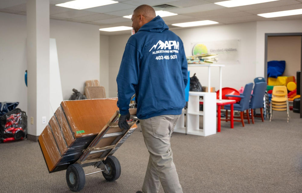 Commercial movers relocating office furniture in Calgary